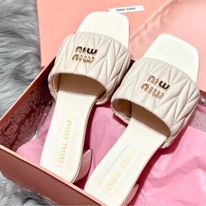 Miu Miu Quilted Cream Slide Mules with Gold Logo Hardware